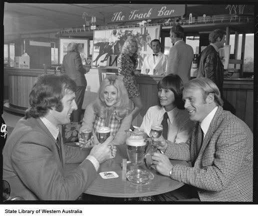 Women listening as men discuss manly things